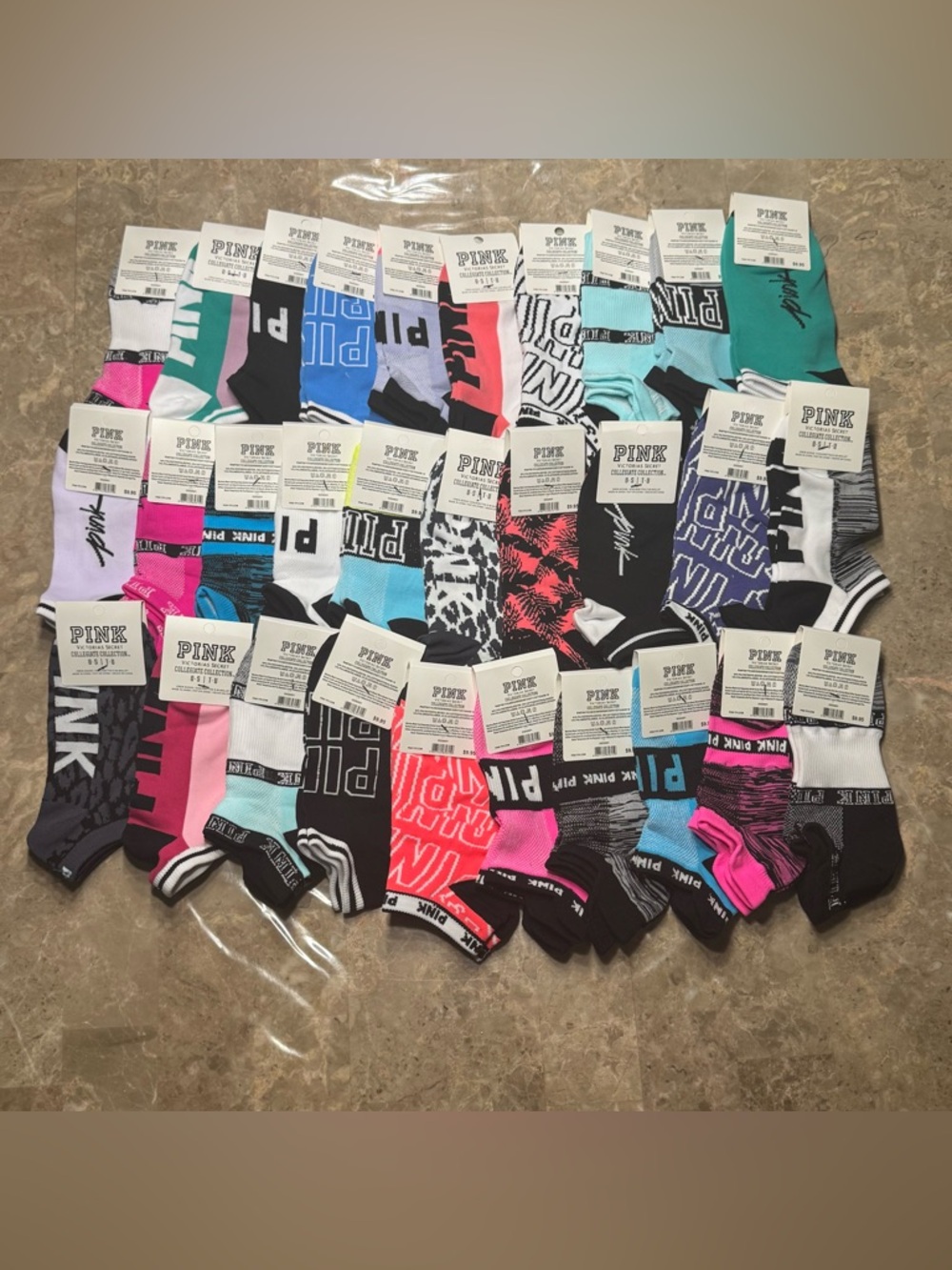 New Pink Victoria’s Secret Socks
With tags 
New Pink socks 
30 pairs included